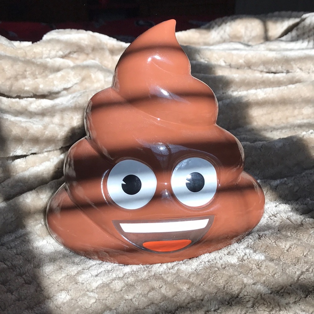 Poop emoji piggy bank